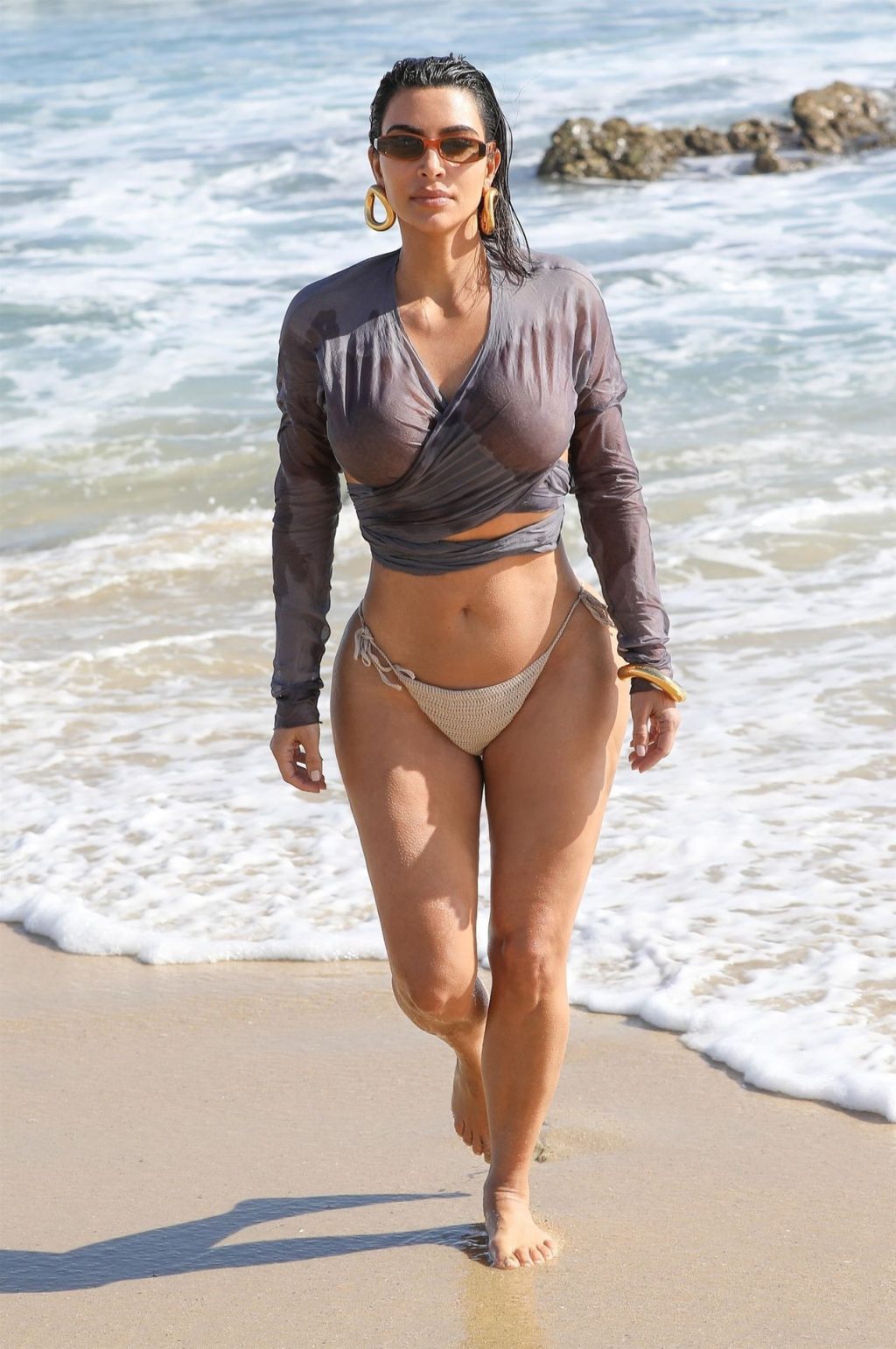 Kim Kardashian Puts on a Sultry Display on the Beach in Malibu (14 Photos)