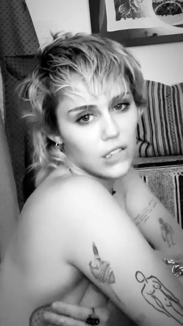 Miley Cyrus Poses Topless (10 Pics + Video)