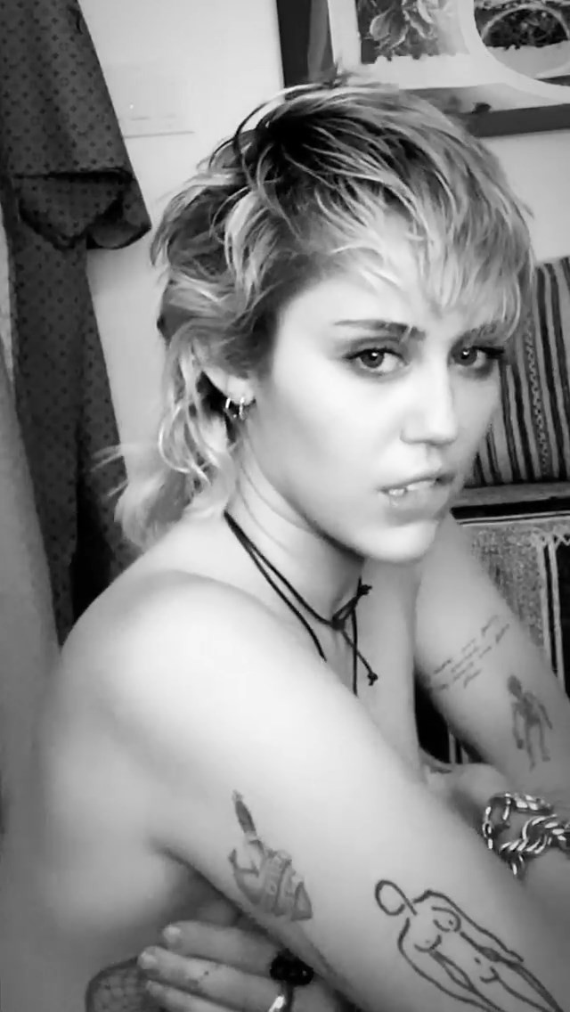 Miley Cyrus Poses Topless (10 Pics + Video)