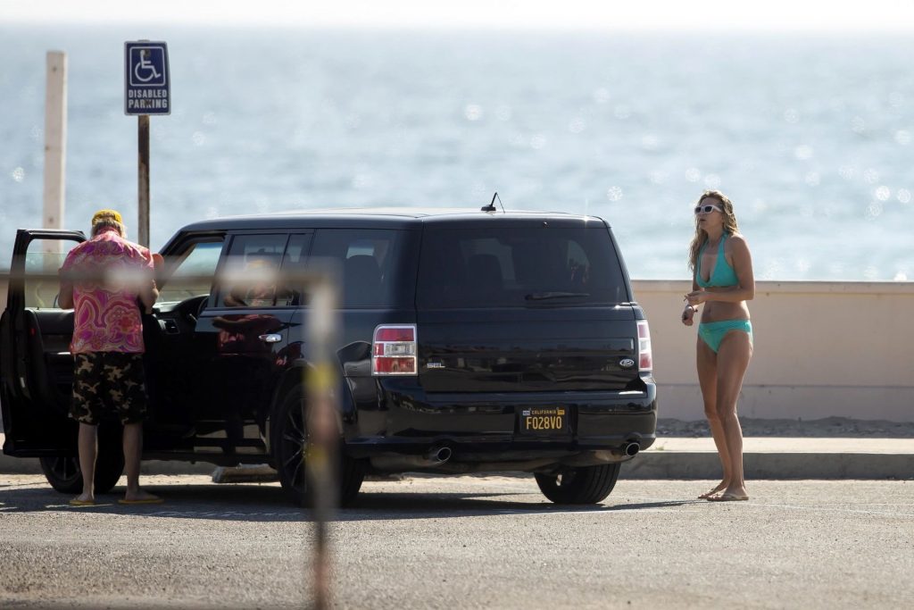 Stephanie Hobgood Smokes a Suspicious Cigarette at the Beach (41 Photos)