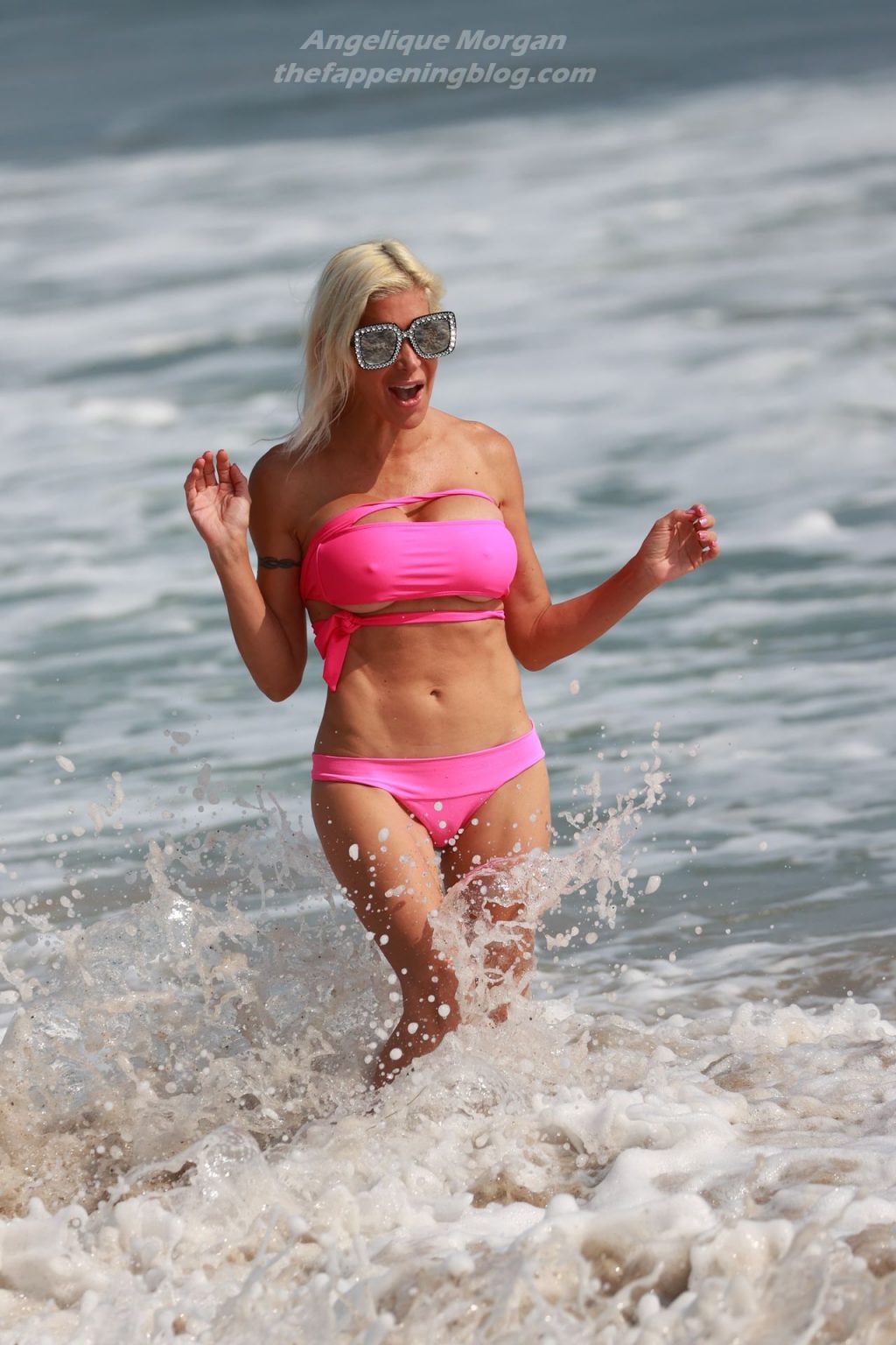 Angelique Morgan Enjoys a Day on the Beach in a Pink Bikini (14 Photos)
