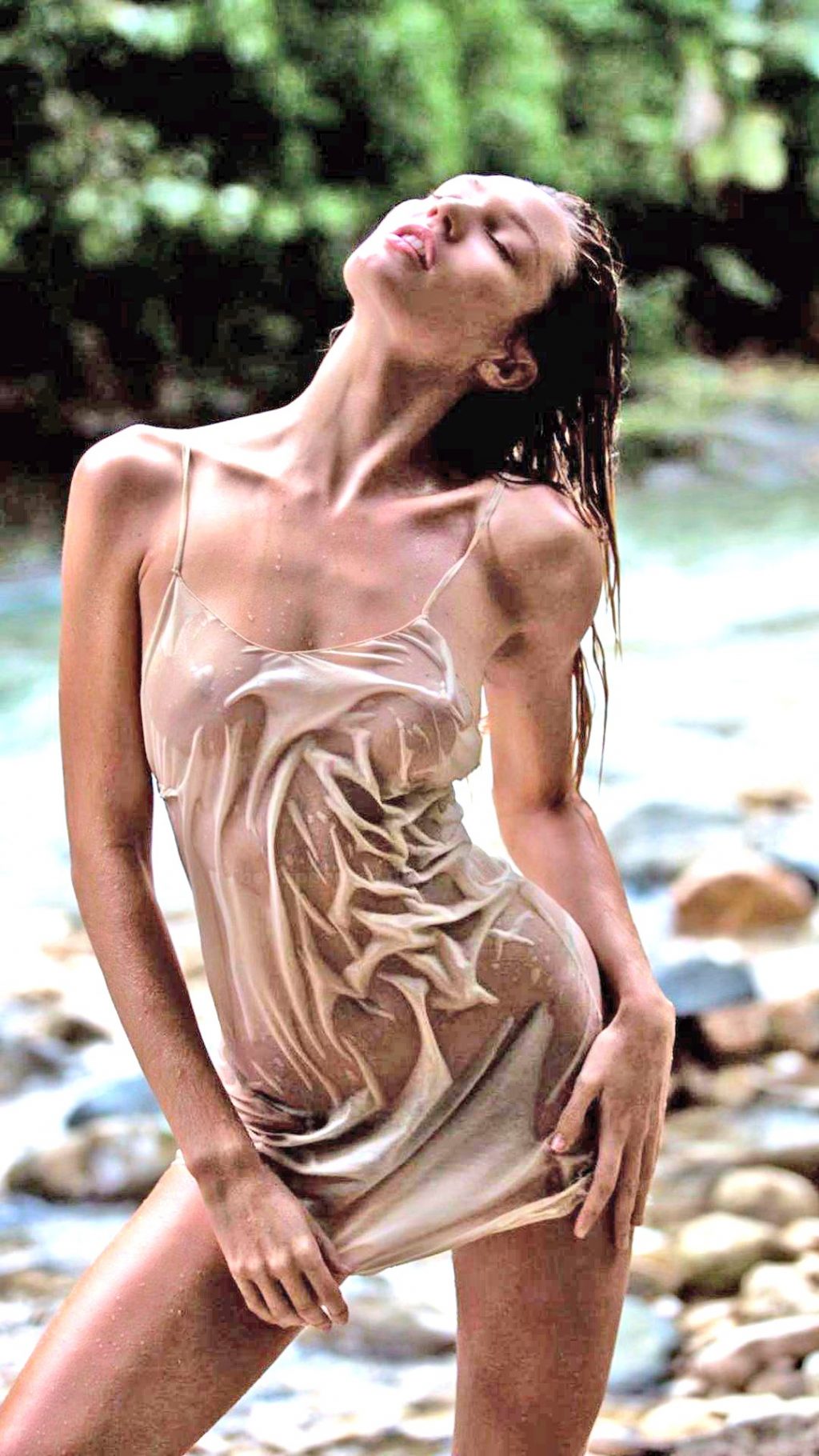 Candice Swanepoel Nude (2 Slightly Nude Photos)