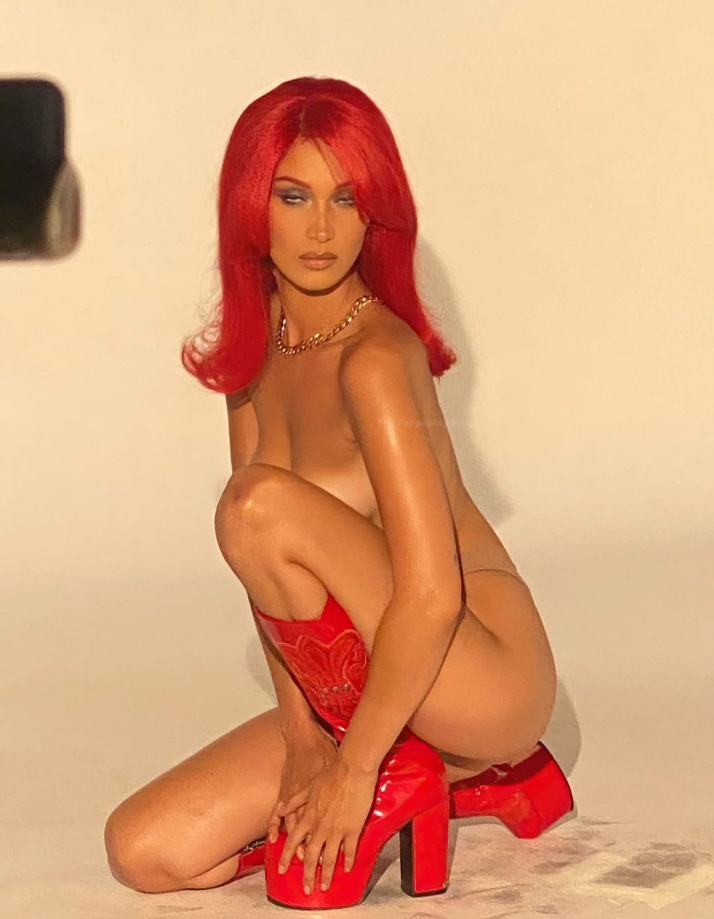 Bella Hadid Poses Topless in Red Boots (4 Hot Photos)