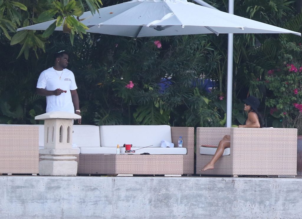 Diddy Hangs Out Back of His Miami Beach Mansion with Hot Bikini Chick (22 Photos)