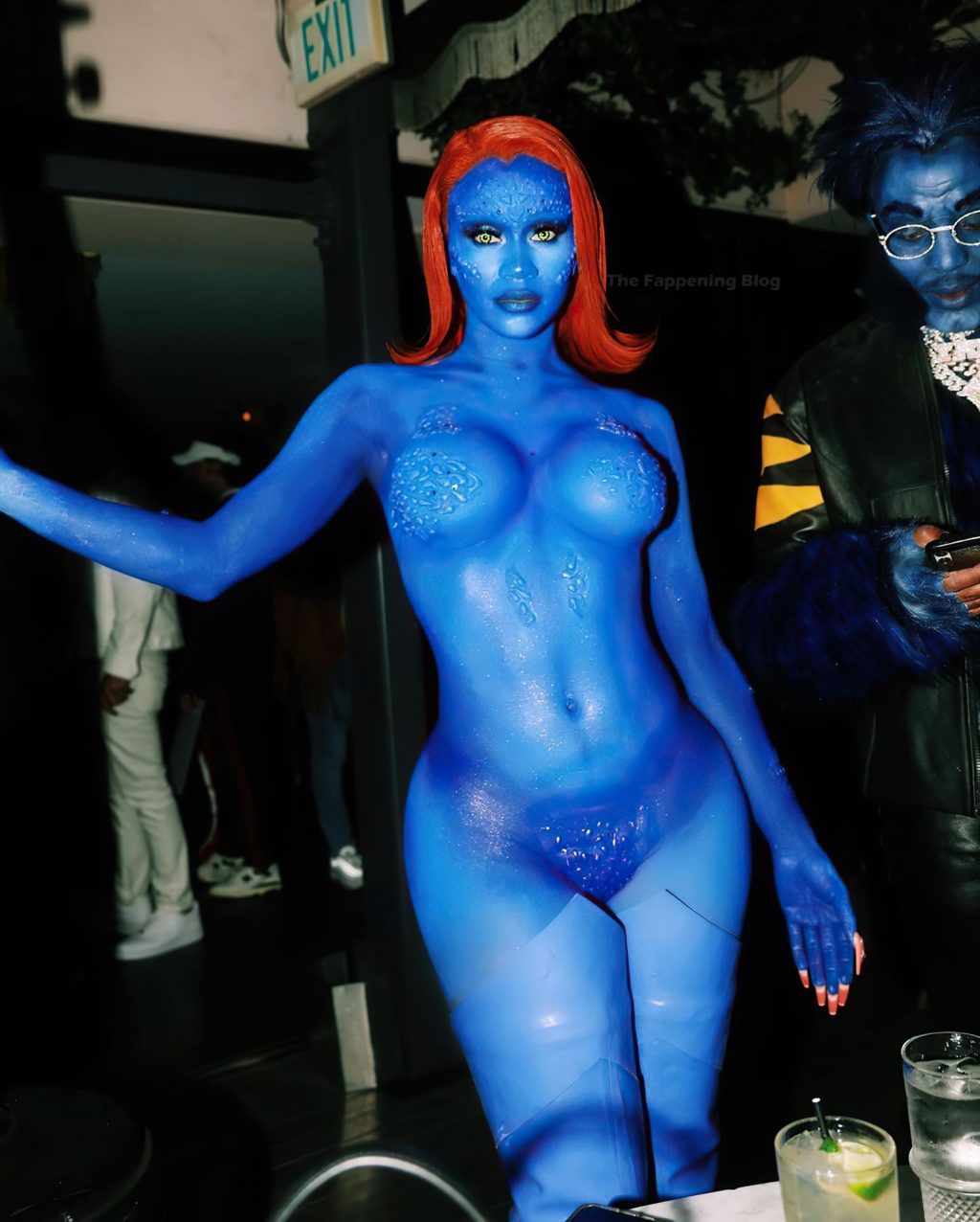 Rapper Saweetie goes naked as Mystique from "X-Men" at the Hallow...