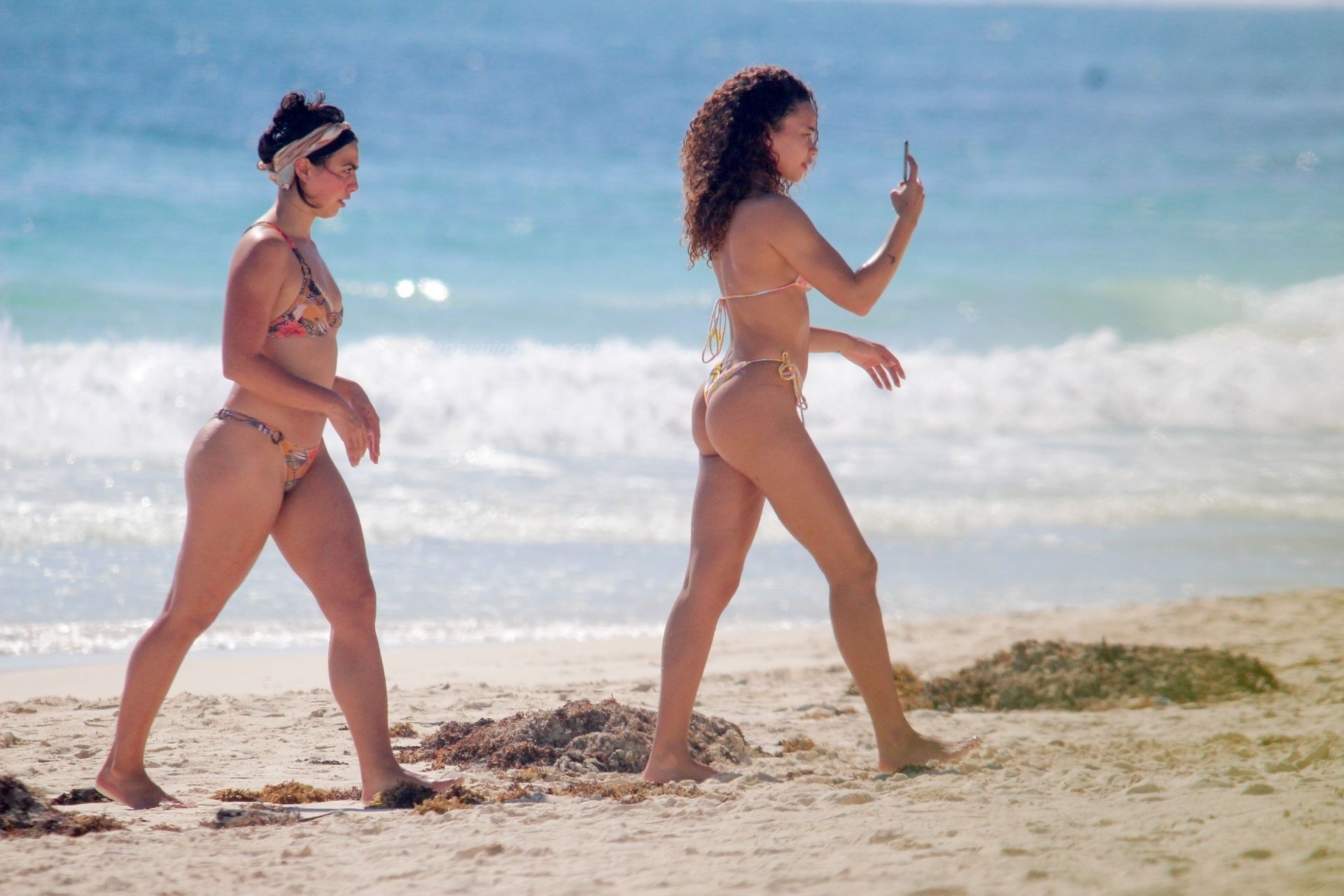 Ashley Moore Flaunts Her Flawless Physique at the Beach with Friends in Tul...