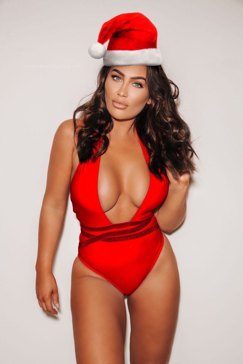 Lauren Goodger Shows Off Her Infamous Bum in a Sexy Santa Outfit (5 Photos)