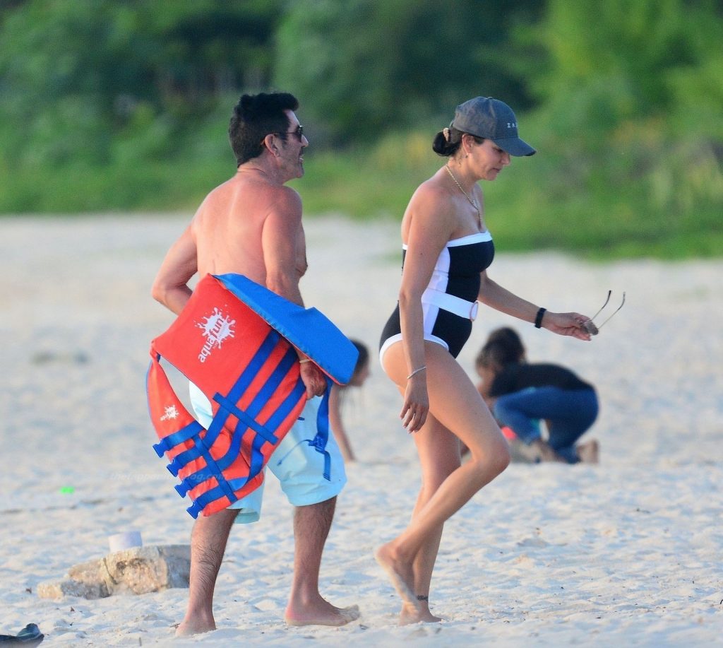 Lauren Silverman Enjoys a Ride with Simon Cowell at Brandons Beach in Barbados (36 Photos)