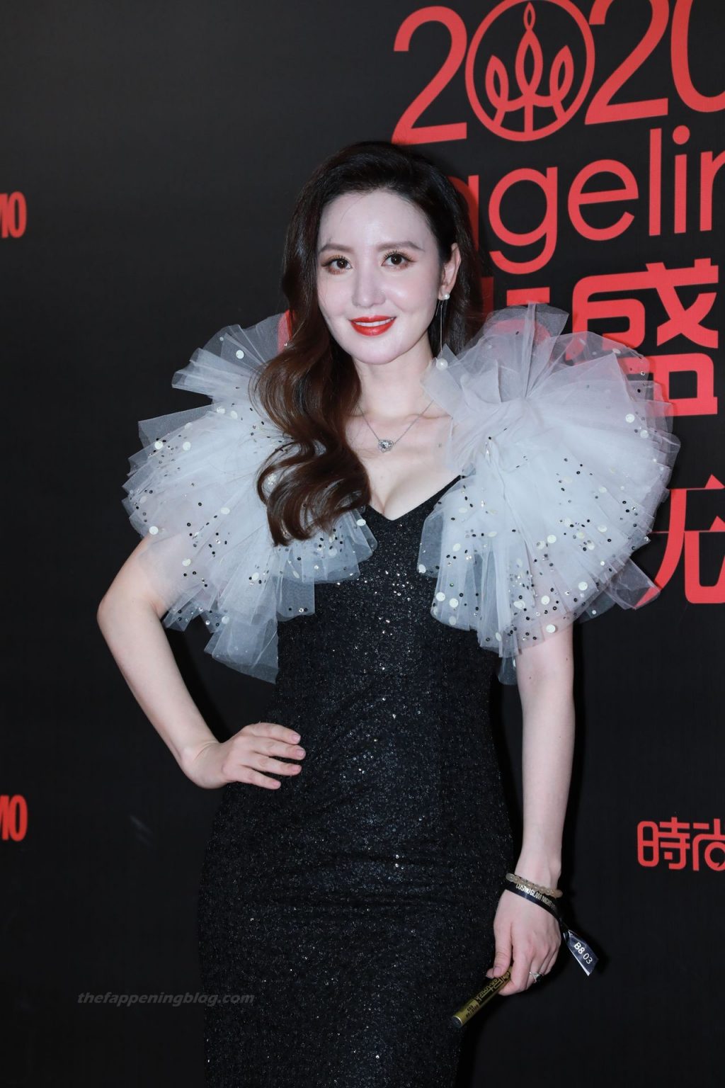 Zhang Meng Shows Her Cleavage at the Cosmo Event (12 Photos)