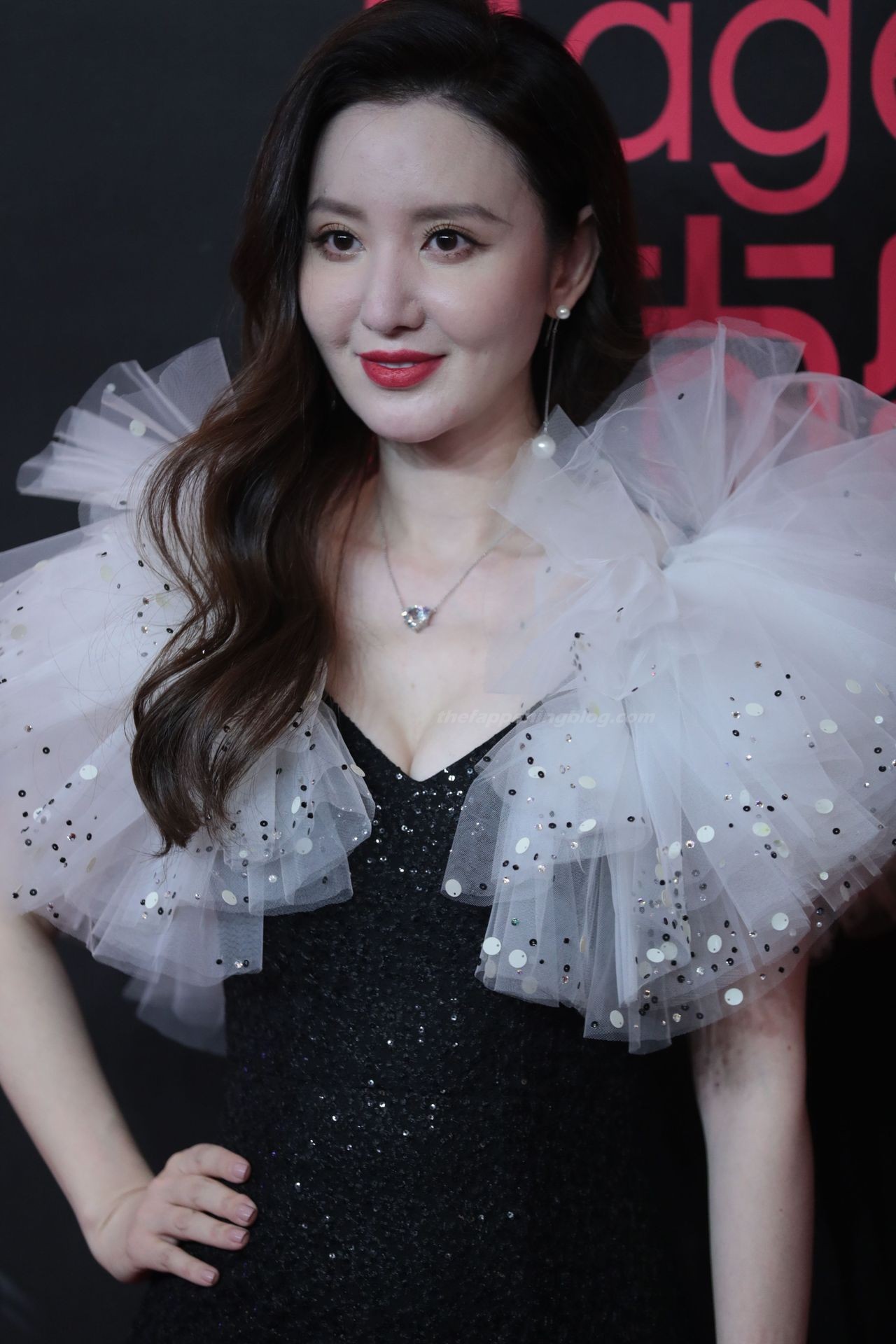 Zhang Meng Shows Her Cleavage at the Cosmo Event