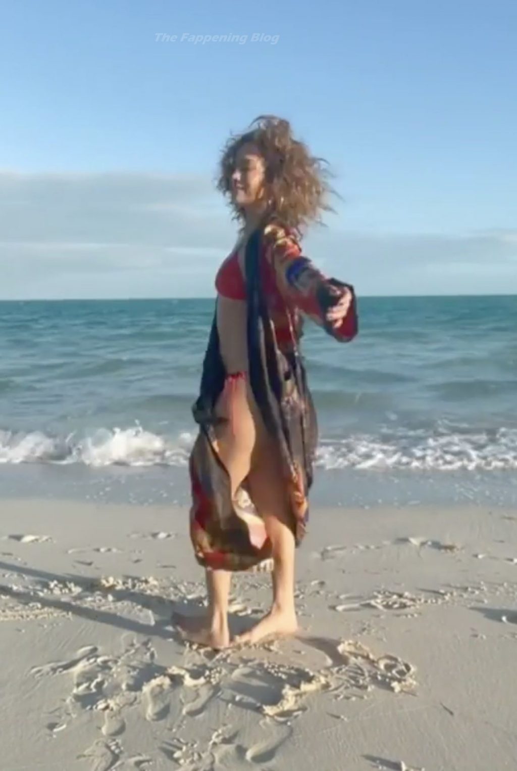 Jennifer Lopez Hits the Beach in a Red Bikini (12 Pics + Video)