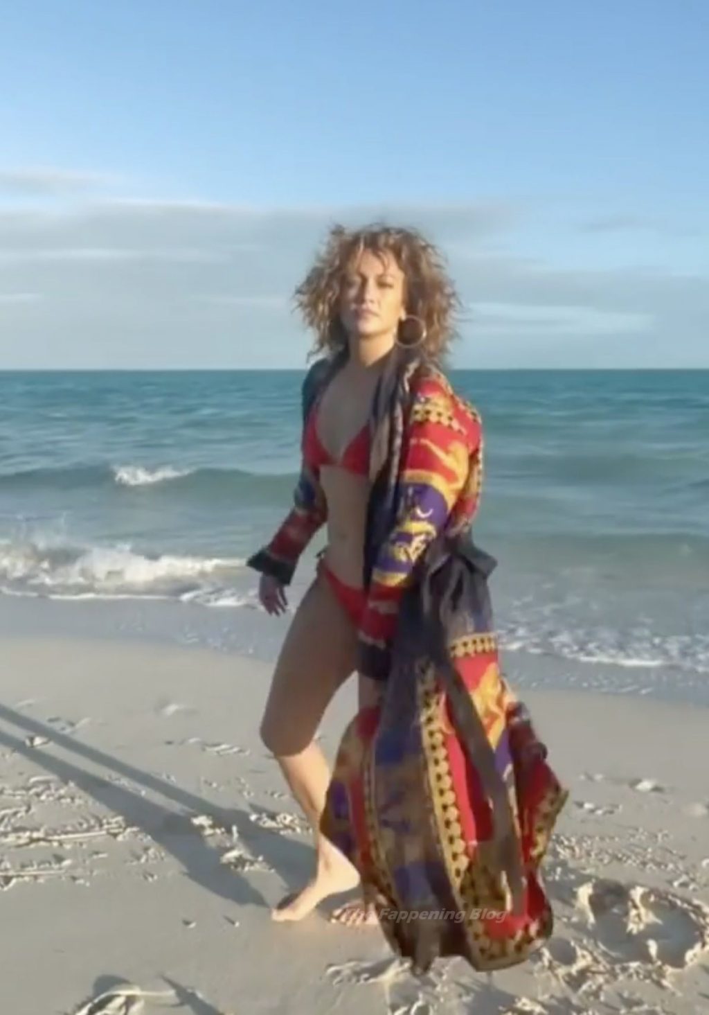 Jennifer Lopez Hits the Beach in a Red Bikini (12 Pics + Video)