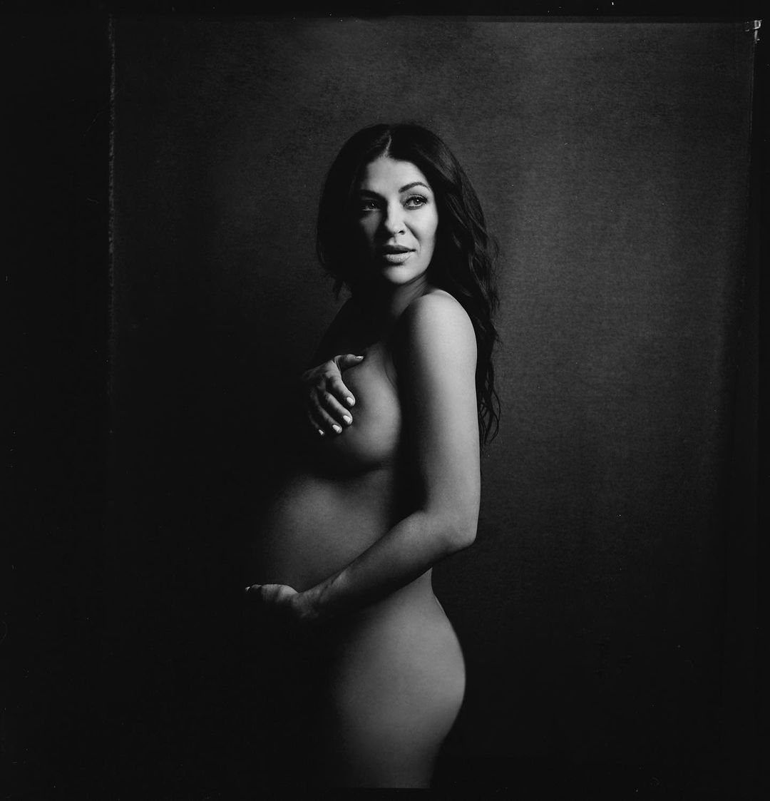 Actress Jessica Szohr poses naked in the bubble bath and pregnant in a stud...