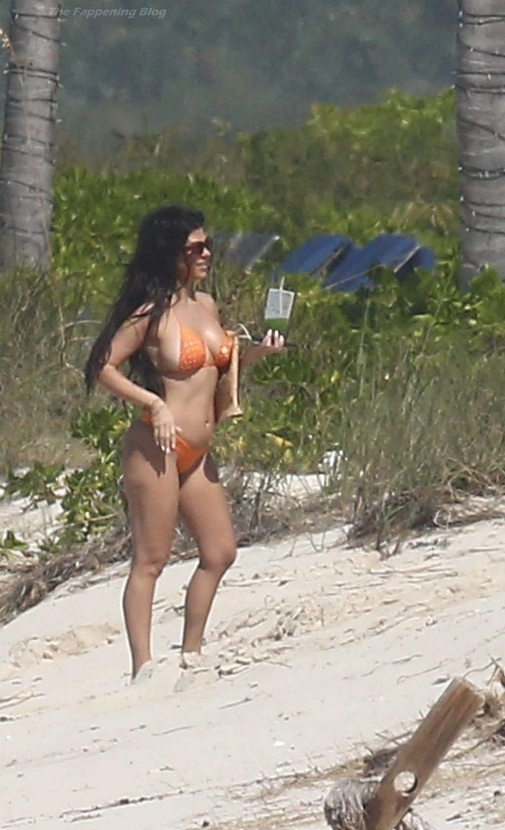 Kourtney and Kim Kardashian Put Their Curves on Display on the Beach in Turks and Caicos (27 Photos)