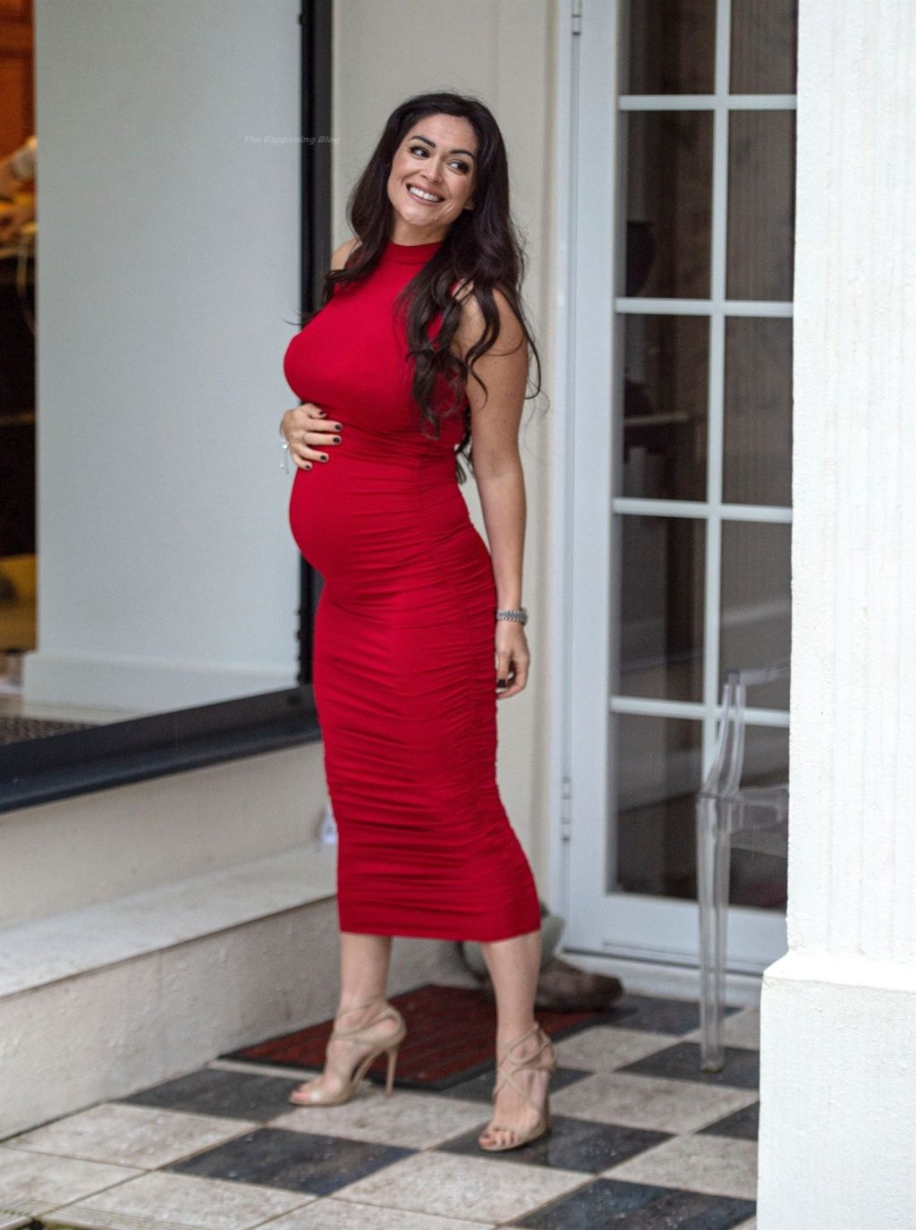 Casey Batchelor Shows Off Her Baby Bump in a Red Dress (14 Photos)