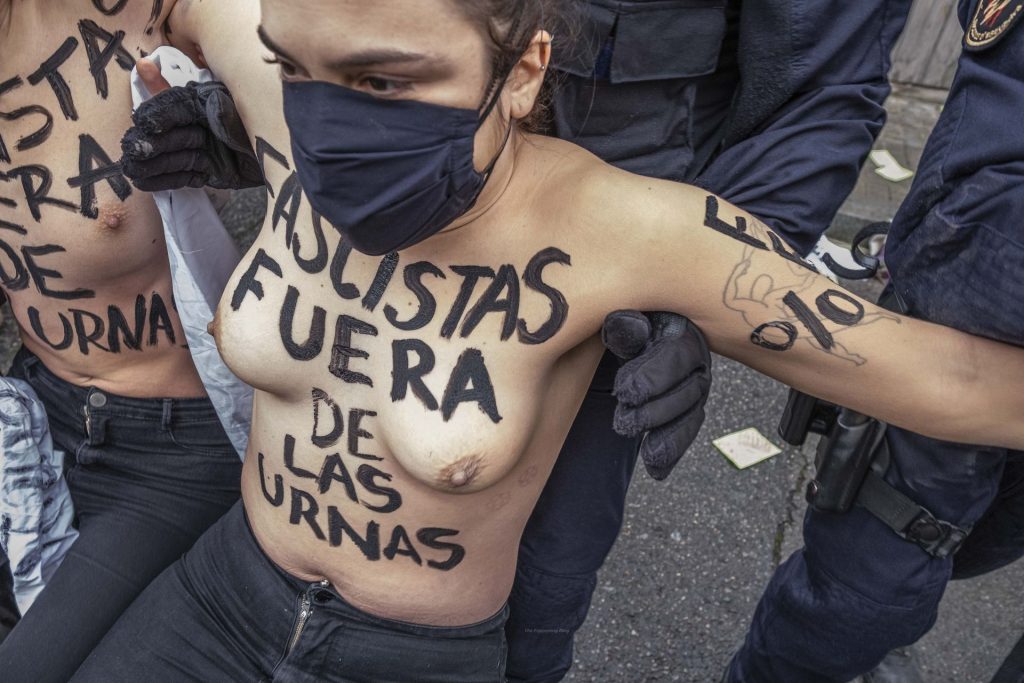 Femen Activists Protest Against Vox Candidate in Barcelona (5 Photos)