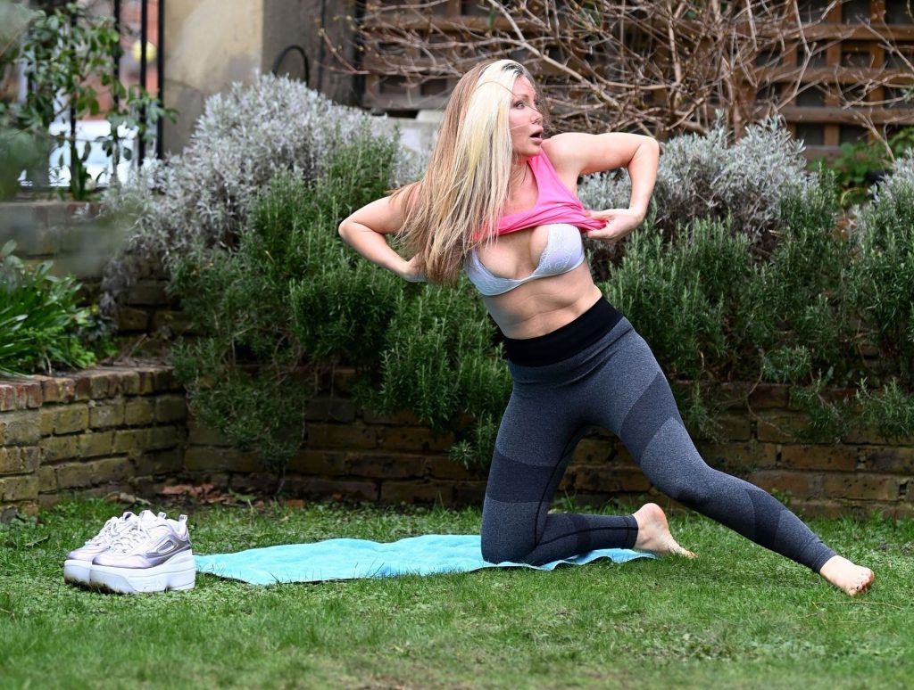 Caprice Practices the Art of Yoga at a London Park (18 Photos)