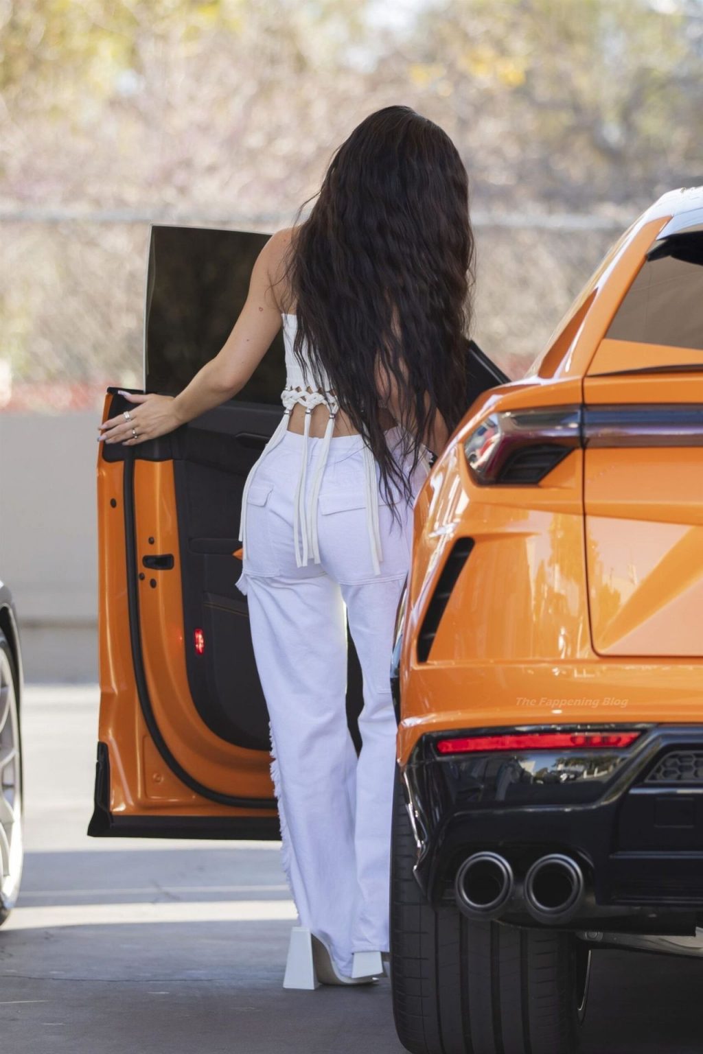 Kylie Jenner Makes a HOT Pit-Stop in Her Orange Lambo (17 Photos)