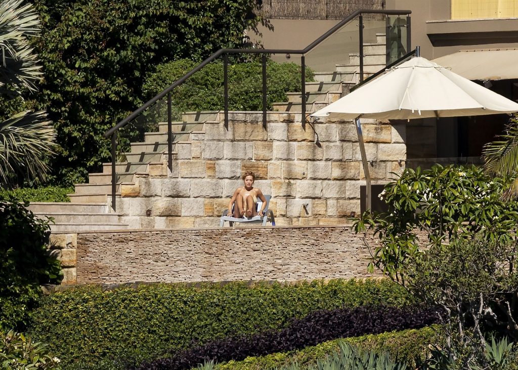 Rita Ora Sunbathes on the Deck of Her Sydney Mansion (28 Photos)