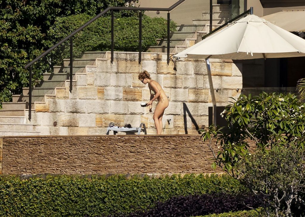 Rita Ora Sunbathes on the Deck of Her Sydney Mansion (28 Photos)
