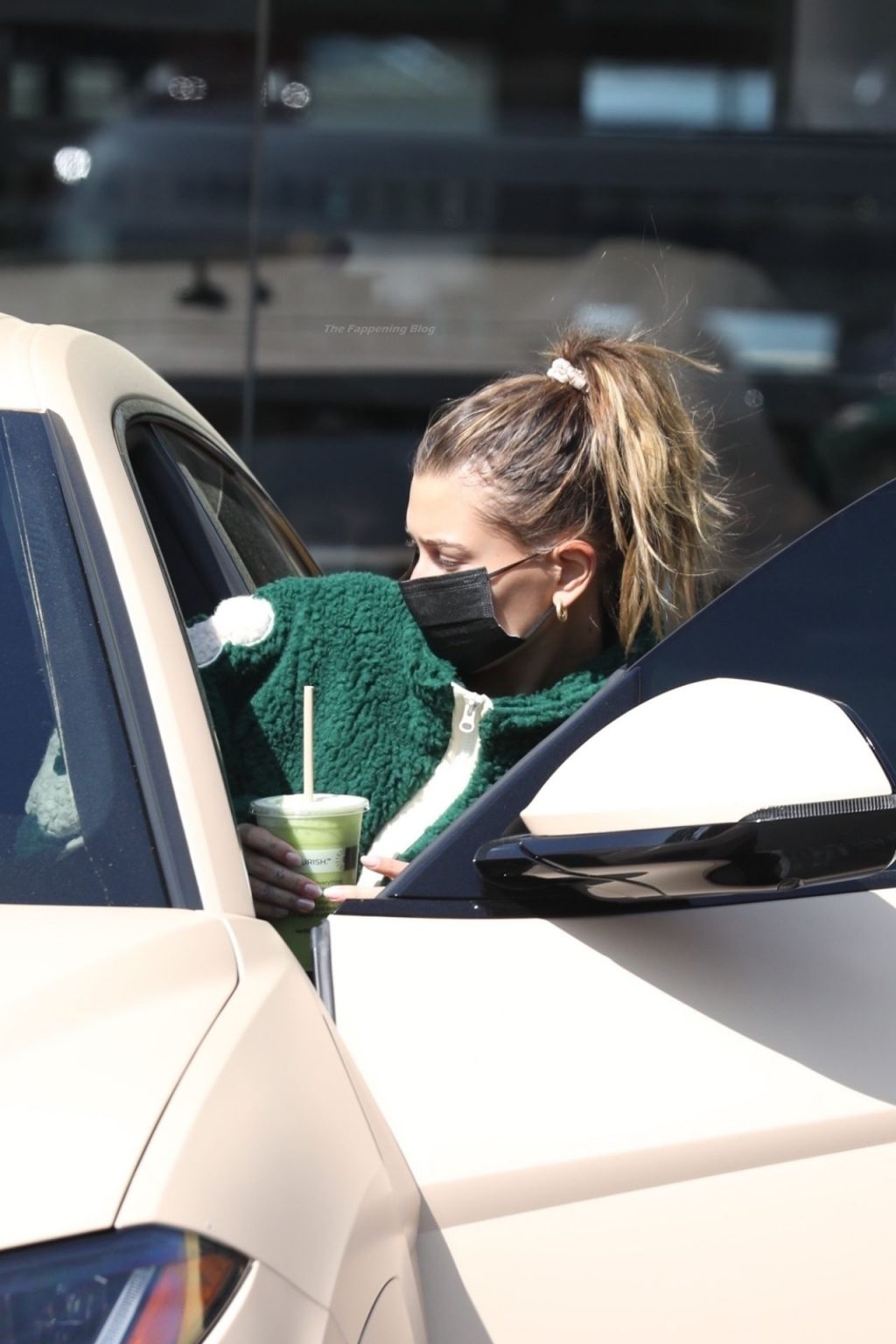 Hailey Bieber Grabs a Drink and Hops in Her Lamborghini Truck (30 Photos)