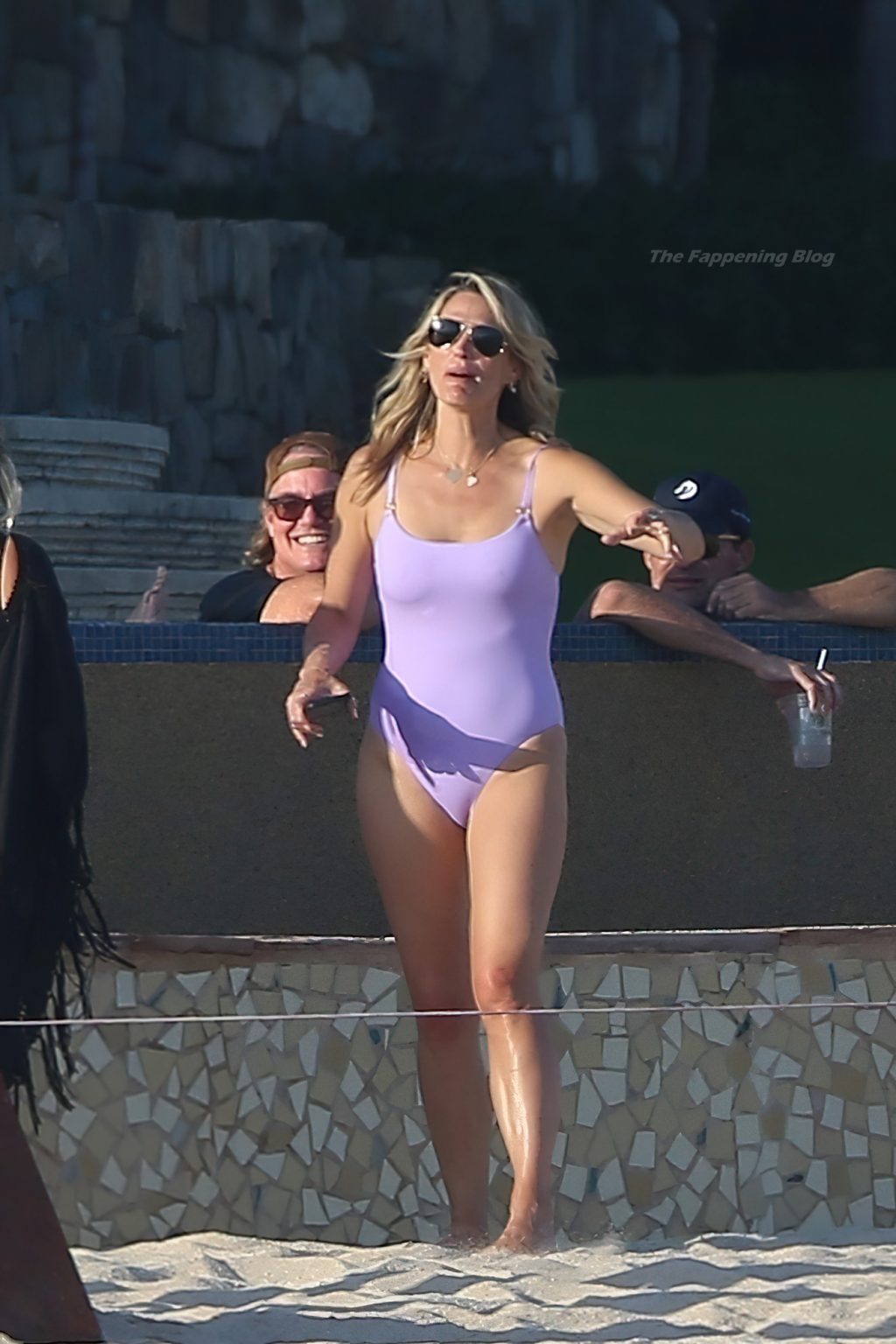 Molly Sims Slips Into a Lavender Swimsuit For a Fun Day at the Beach in Cabo (17 Photos)