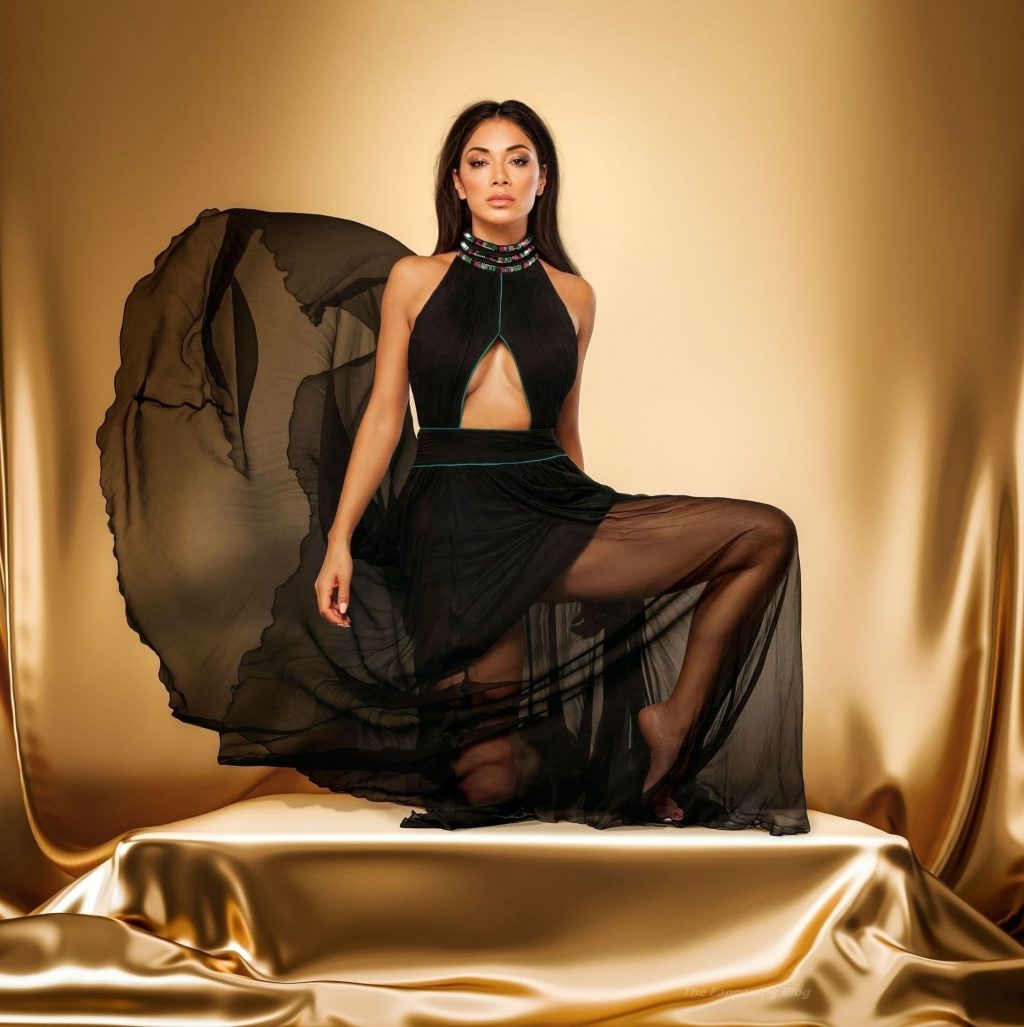Nicole Scherzinger Simply Oozes Sophistication and Class Surrounded by Golden Luxurious Fabric During a Photoshoot (9 Photos)