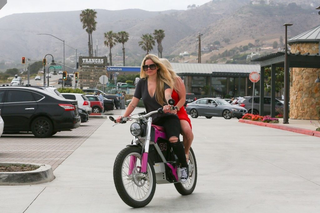 Avril Lavigne is Seen Taking a Friend for an Electric Motorcycle Ride on Memorial Day (85 Photos)