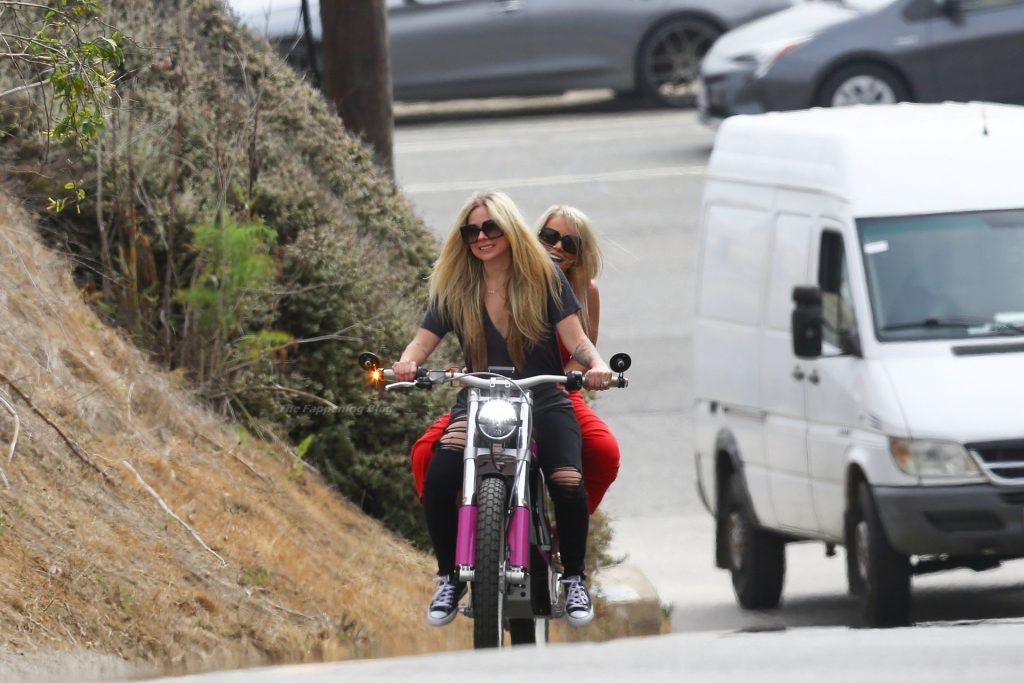 Avril Lavigne is Seen Taking a Friend for an Electric Motorcycle Ride on Memorial Day (85 Photos)