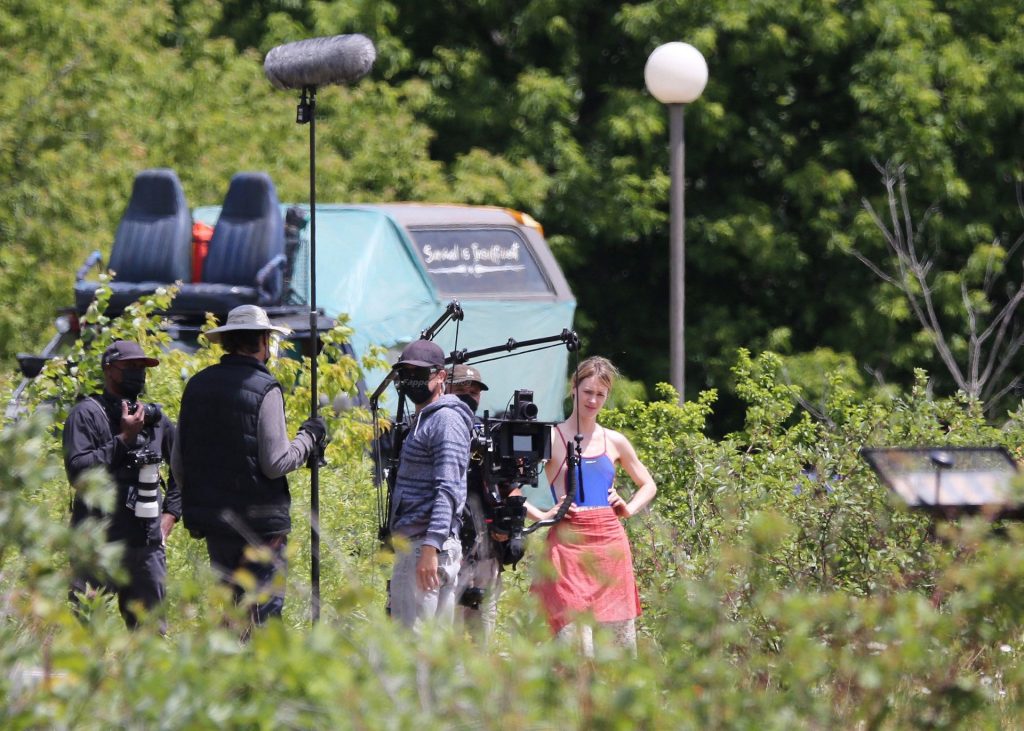 Mackenzie Davis Holds a Tree Pruner Saw Blade on set Filming ‘Station Eleven’ in Toronto (33 Photos)