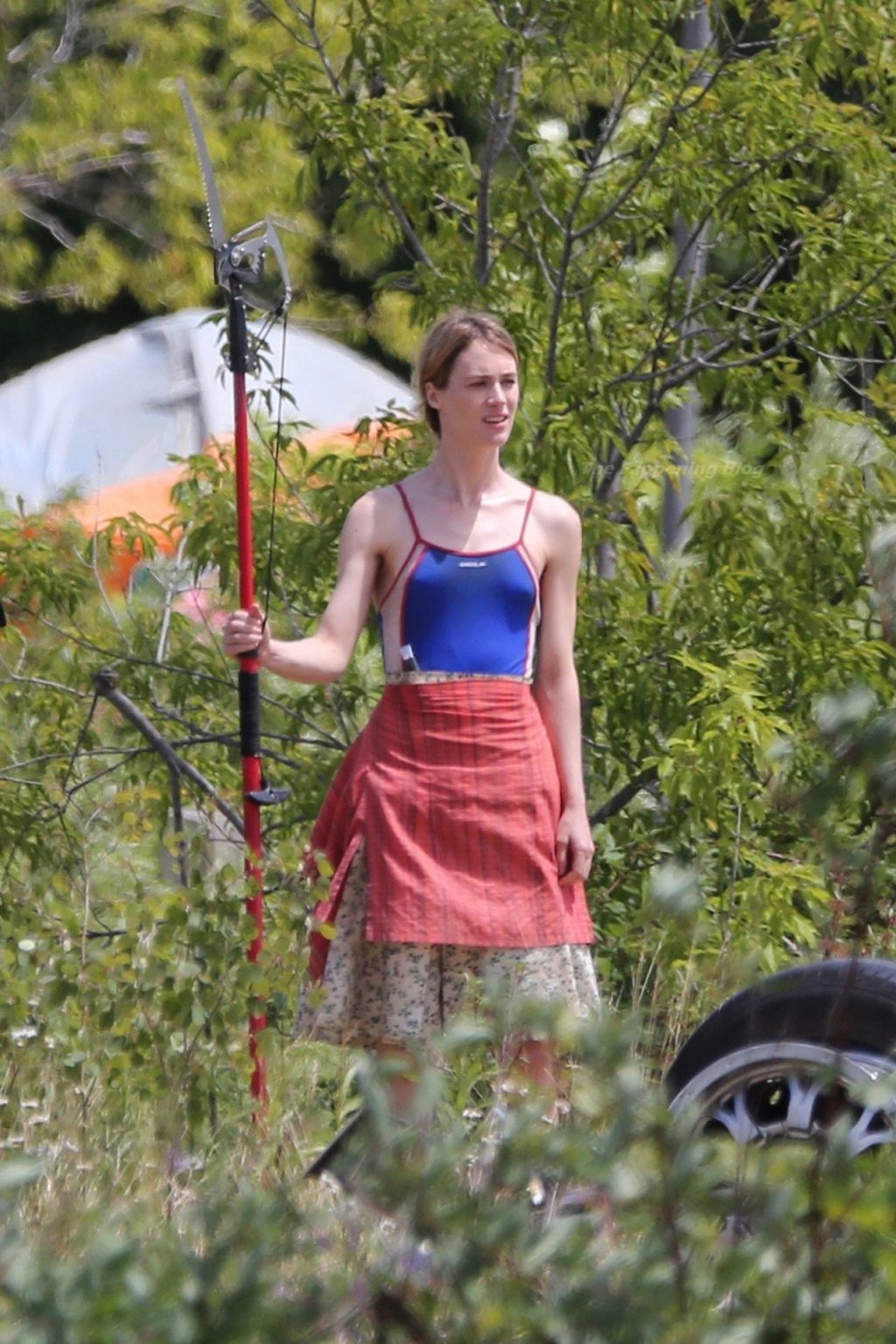 Mackenzie Davis Holds a Tree Pruner Saw Blade on set Filming ‘Station Eleven’ in Toronto (33 Photos)