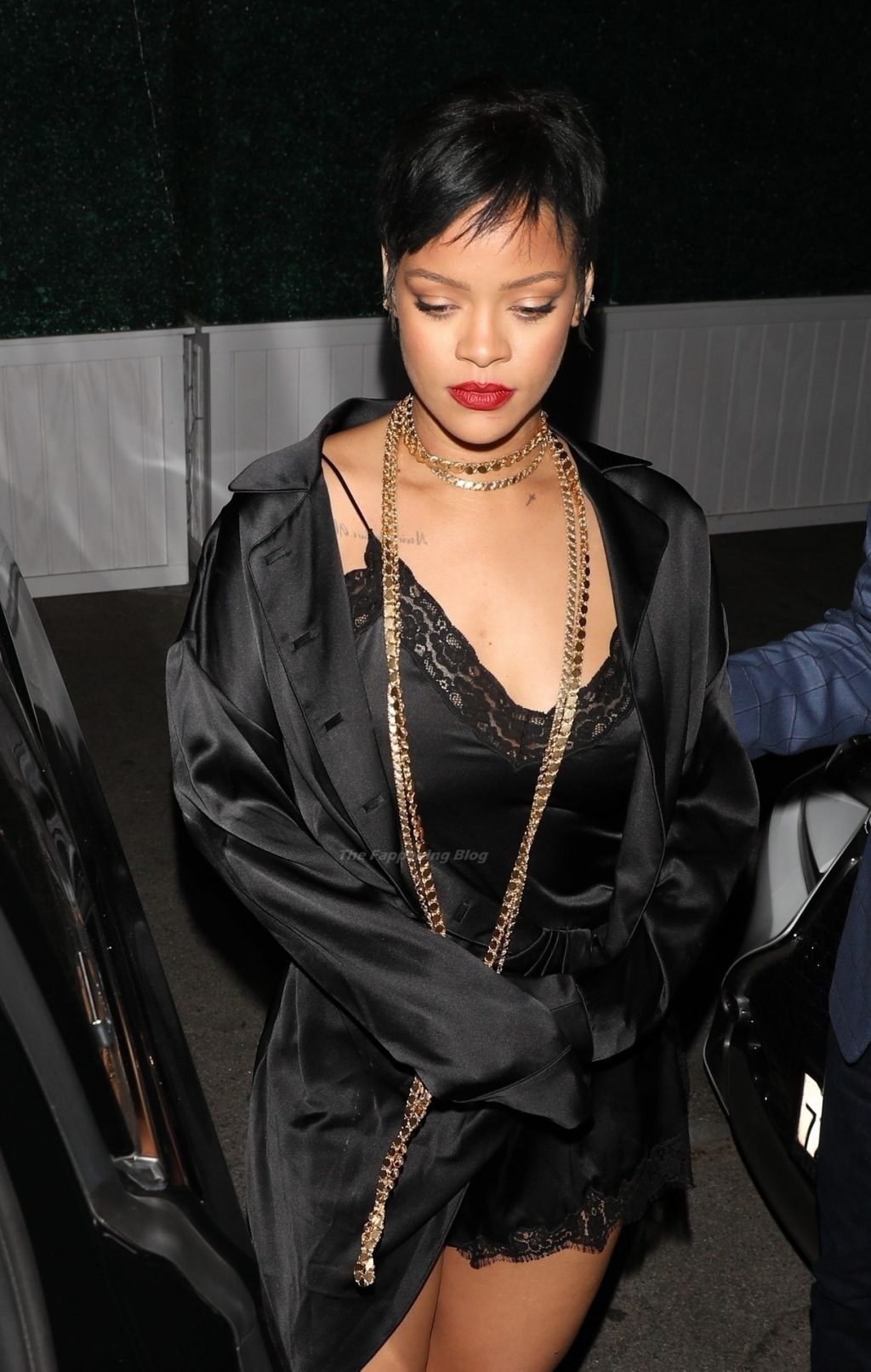 Rihanna Puts on a Sultry Display in Black Silk While Leaving Delilah Nightclub with Friends (22 Photos)