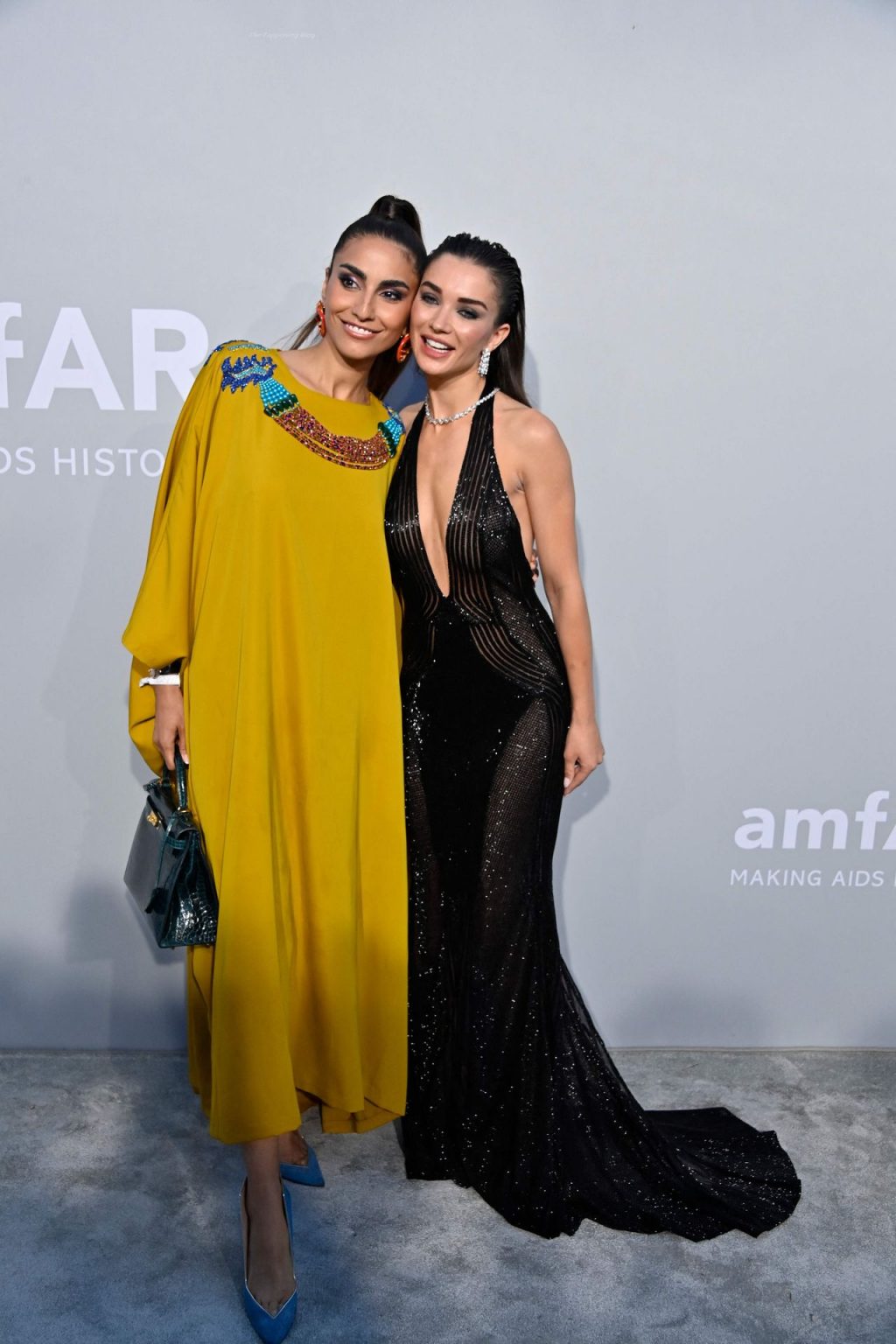 Amy Jackson Flaunts Her Nude Tits in a See-Through Dress at the 27th AmfAR Gala (24 Photos)