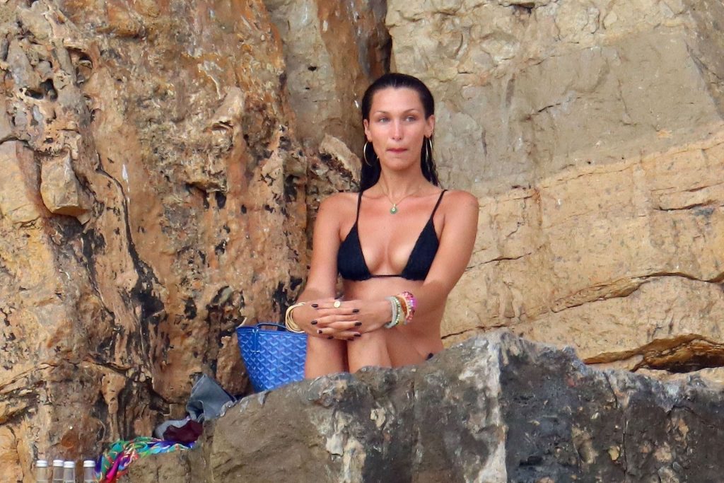 Bella Hadid Shows Off Her Svelte Physique Wearing a Black Bikini Out On Holiday at Eden Roc (46 Photos)