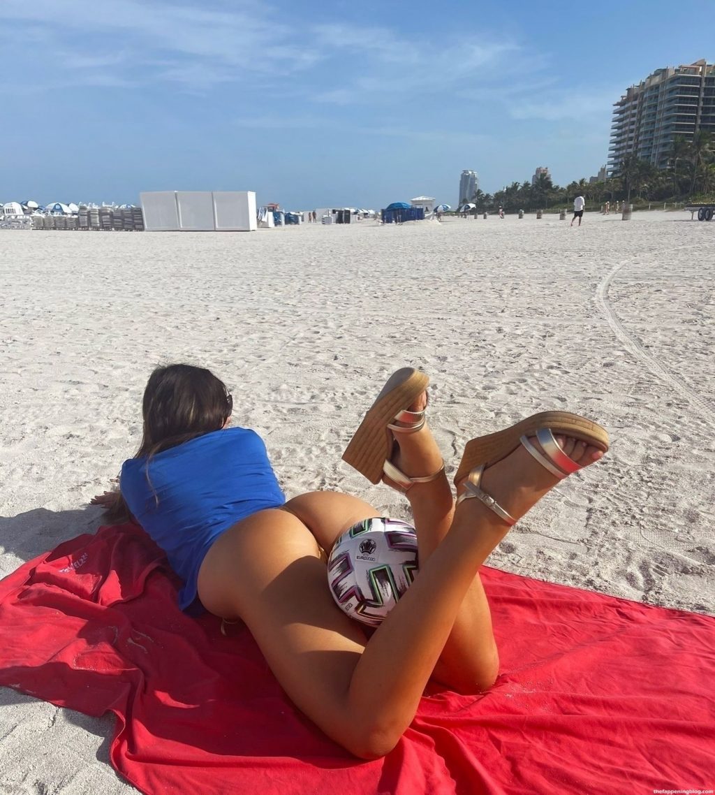 Claudia Romani Poses on the Beach in Miami (16 Photos) [Updated]