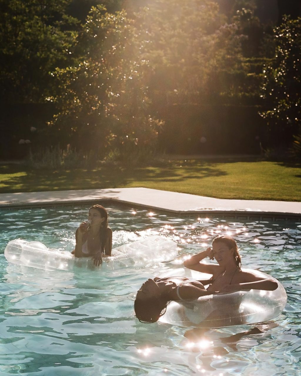 Hailey Clauson Shows Off Her Sexy Bikini Body in the Pool (13 Photos)