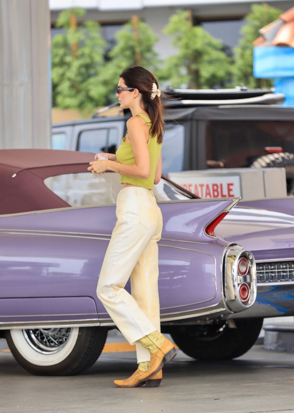 Kendall Jenner Stuns in a Crop Top Without a Bra as She Makes a Pit Stop at the Gas Pump (20 Photos)