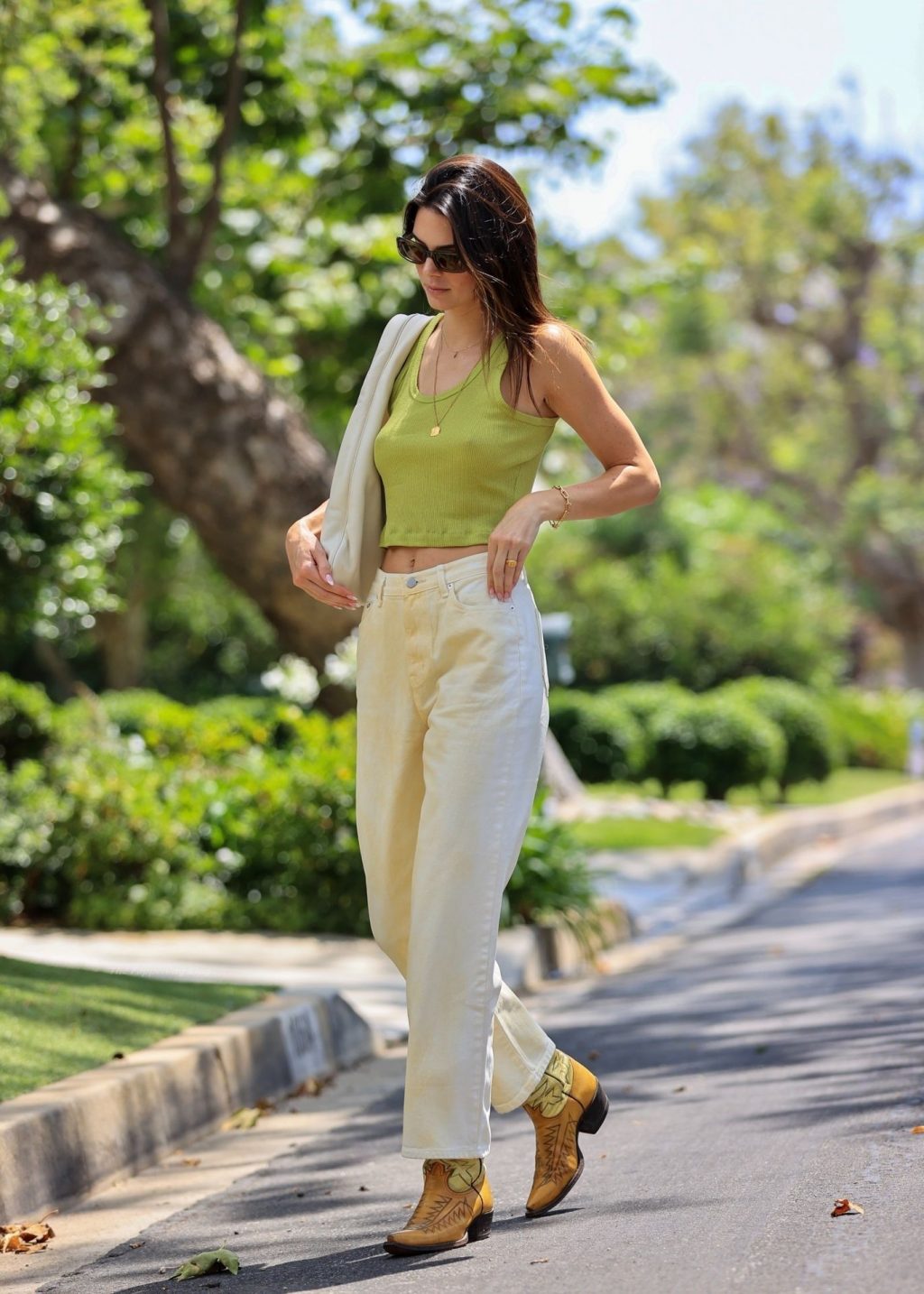Kendall Jenner Stuns in a Crop Top Without a Bra as She Makes a Pit Stop at the Gas Pump (21 Photos) [Updated]