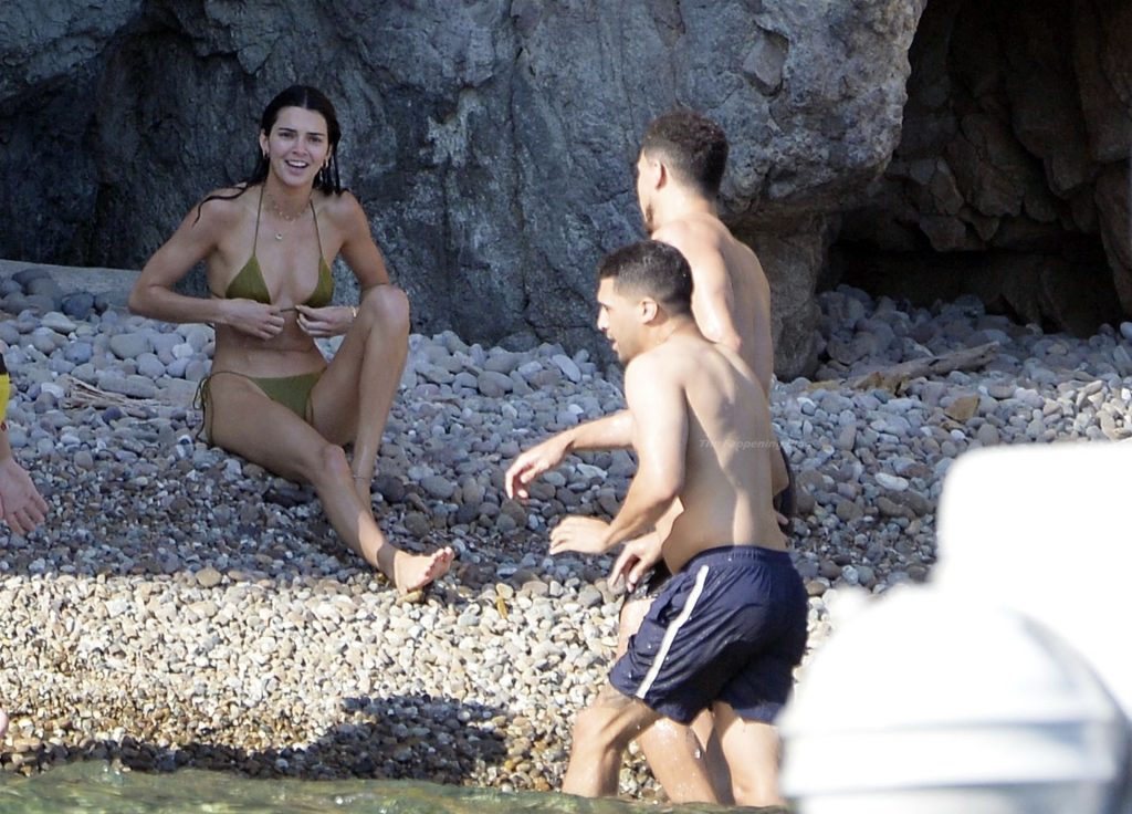 Kendall Jenner Shows Off Her Incredible Toned Body in a Tiny Green Bikini (42 Photos) [Updated]