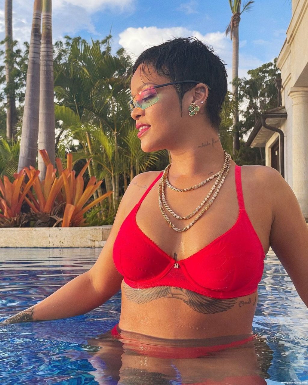 Rihanna Shows Off Her Sexy Body in the Pool (16 Photos)