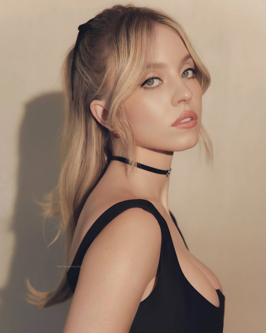 Sydney Sweeney Shows Off Her Ample Cleavage for ‘The Voyeurs’ (11 Photos)