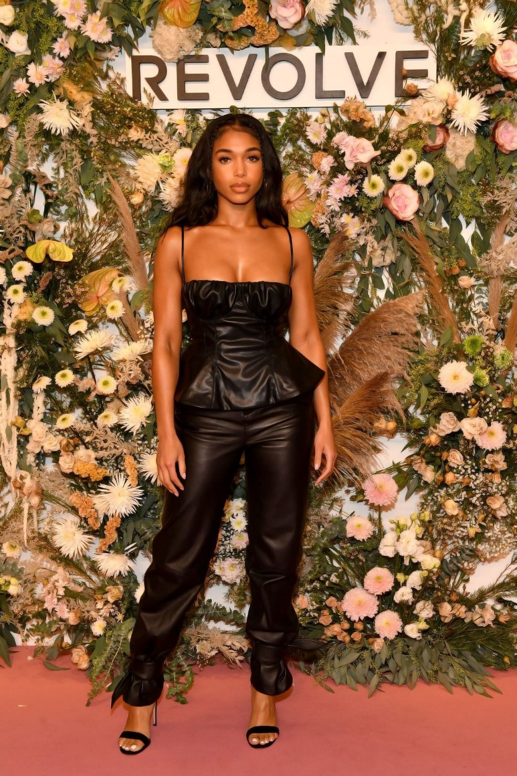 Lori Harvey Flaunts Her Cleavage During NYFW (3 Photos + Video)