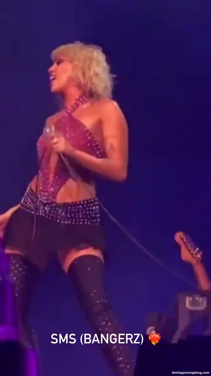 Miley Cyrus Shows Off Her Butt on Stage (49 Pics + Video)