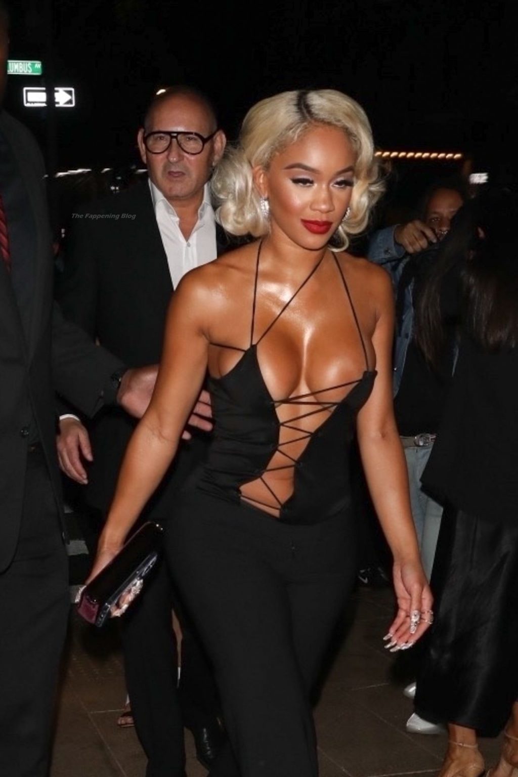 Saweetie Shows Off Her Boobs in a Lace-Up Barely There Blouse at the Tom Ford Fashion Show (37 Photos)