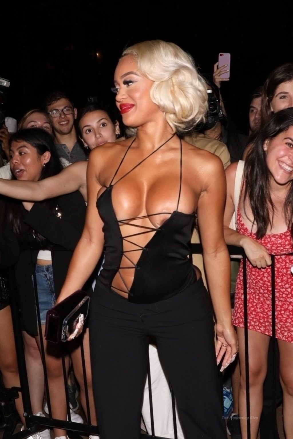 Saweetie Shows Off Her Boobs in a Lace-Up Barely There Blouse at the Tom Ford Fashion Show (37 Photos)