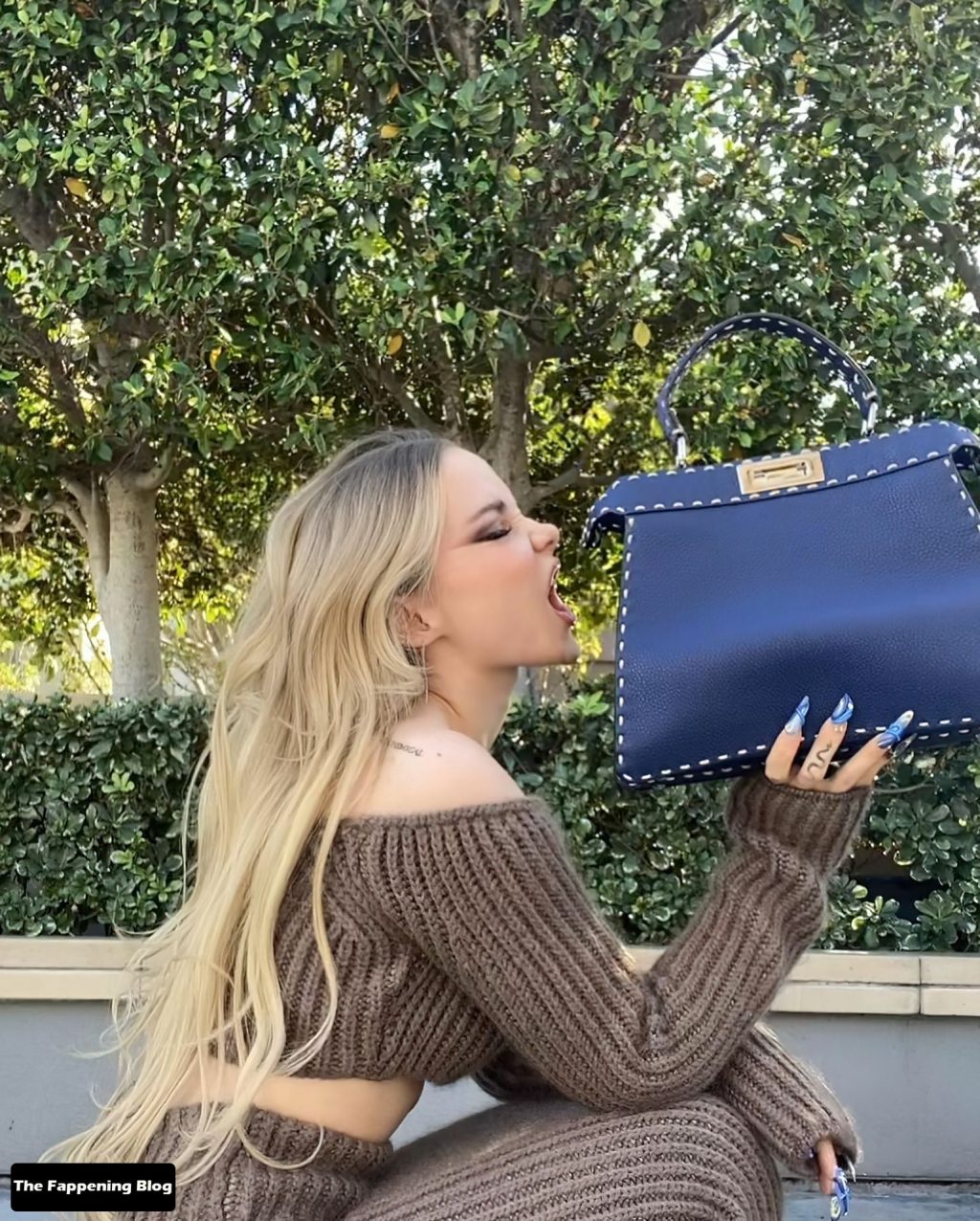 Dove Cameron Looks Beautiful as She Poses Braless for Fendi (8 Photos)
