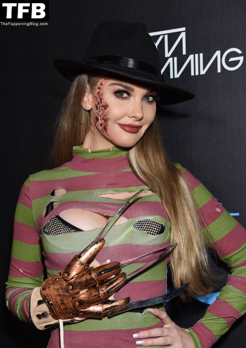 Emily Sears Cosplays Freddy Krueger at Halloween Party (7 Photos)