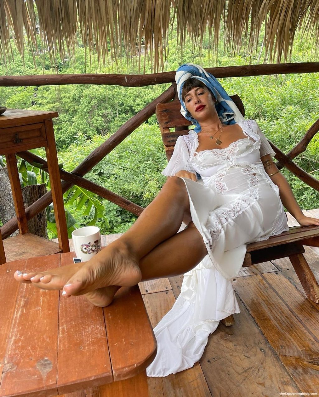 Jackie Cruz Shows Her Sexy Legs and Tits in a White Dress (5 Photos)