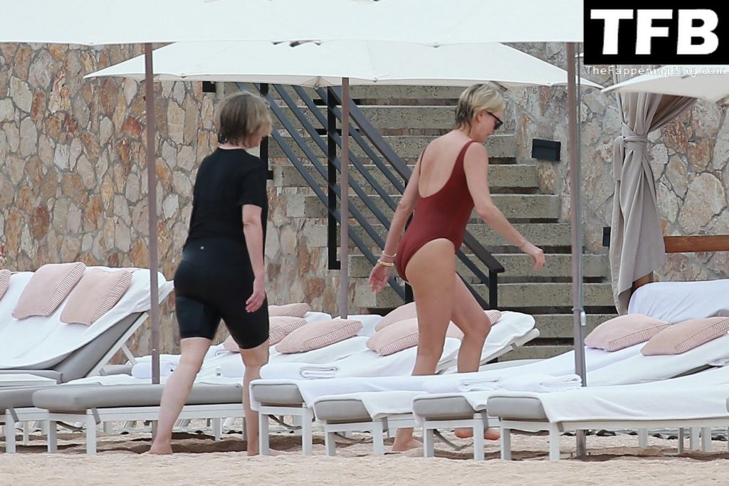 Charlize Theron Sets Pulses Racing in a Red Hot One-Piece Swimsuit (61 Photos)