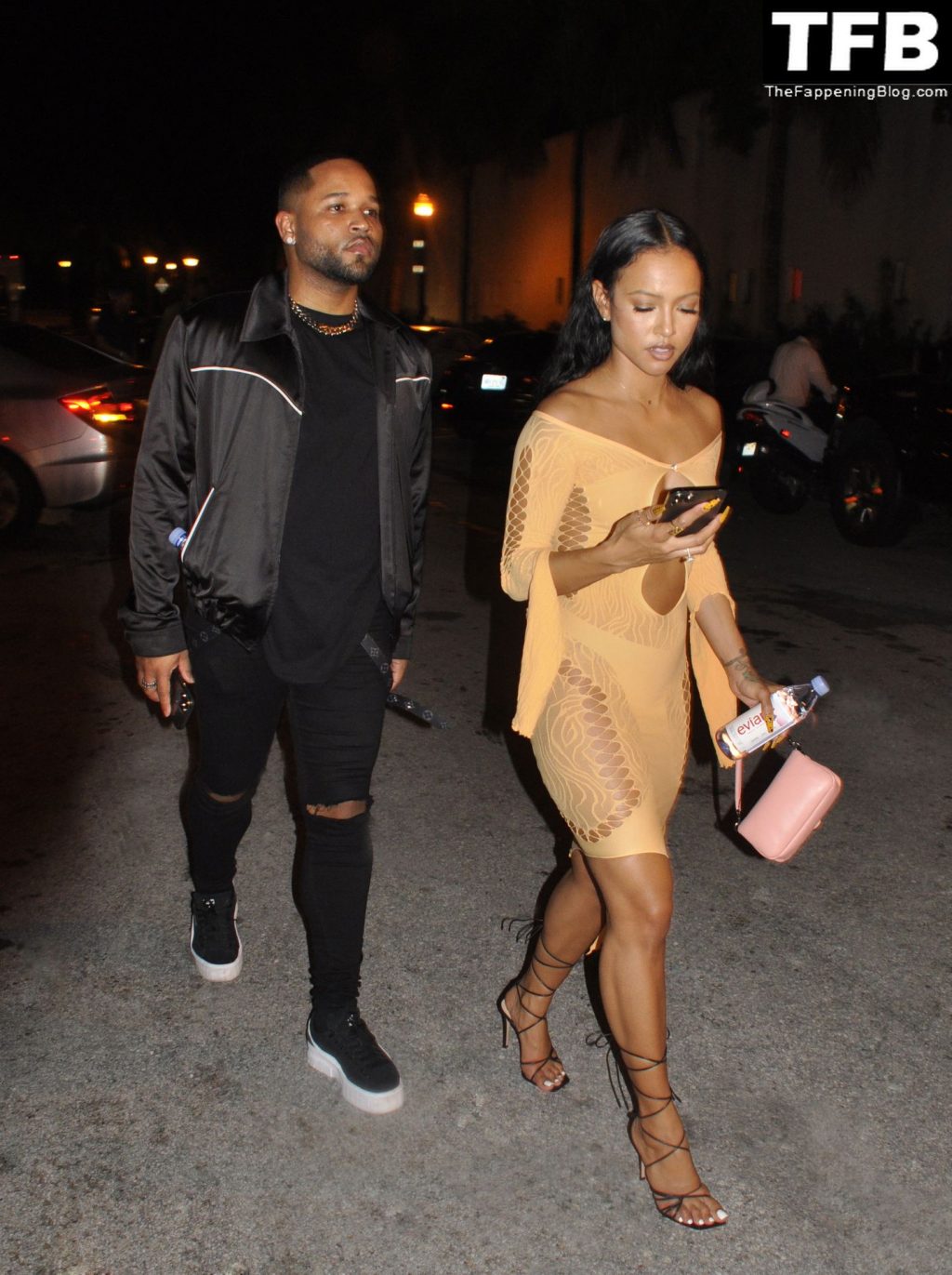 Braless Karrueche Tran Sticks Out Her Tongue as She Leaves Party During Art Basel (11 Photos)